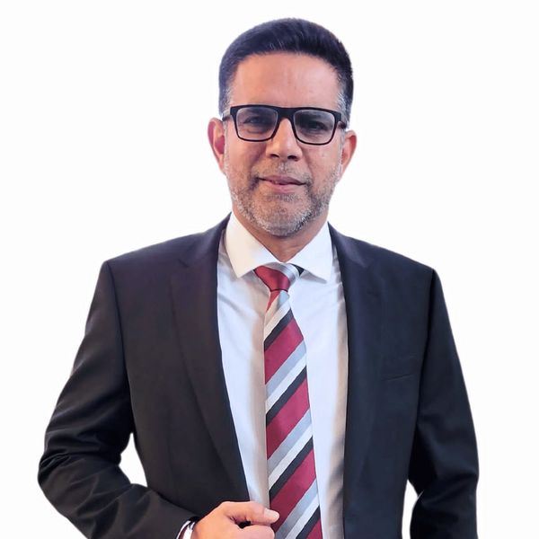 Aman Dhanju, Associate